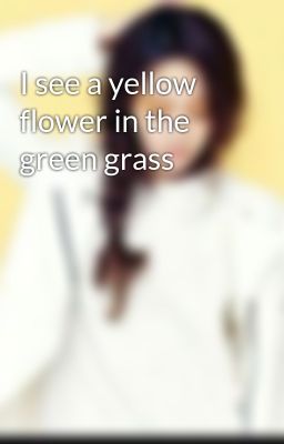 I see a yellow flower in the green grass